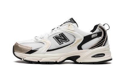 New Balance 530 Nero Bianco Oro