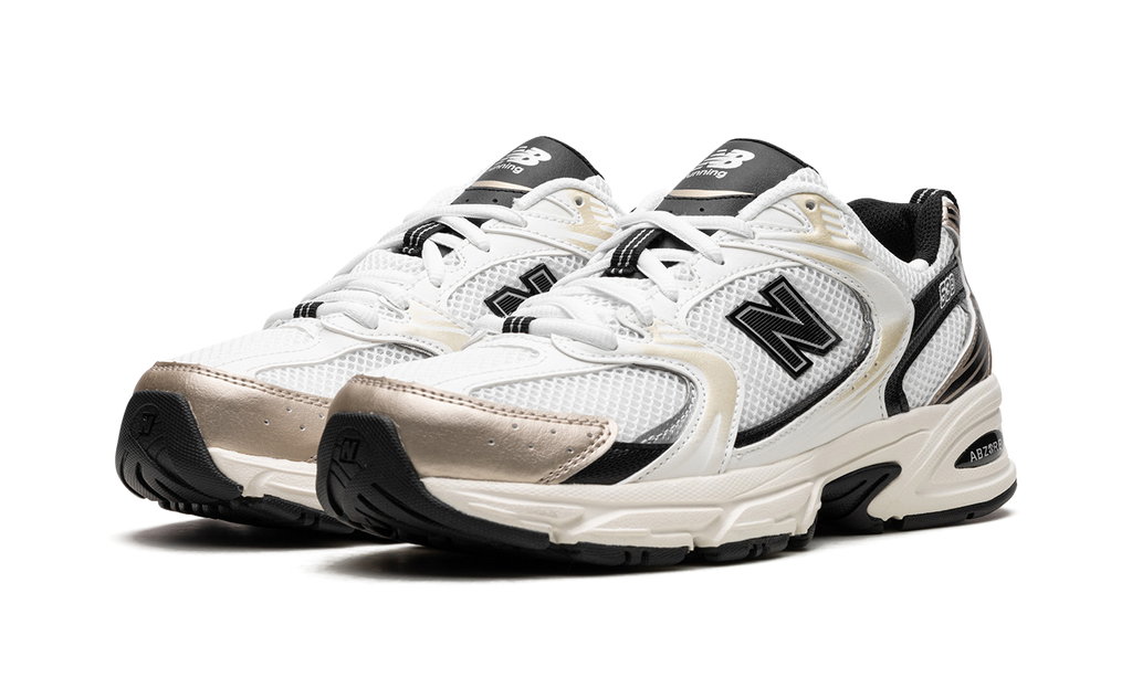 New Balance 530 Nero Bianco Oro