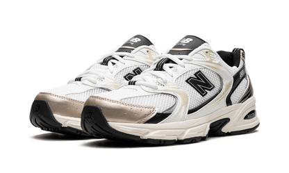 New Balance 530 Nero Bianco Oro